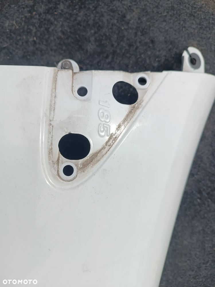 BŁOTNIK PRAWY PRZÓD PRZEDNI RENAULT CLIO III 185 - 2