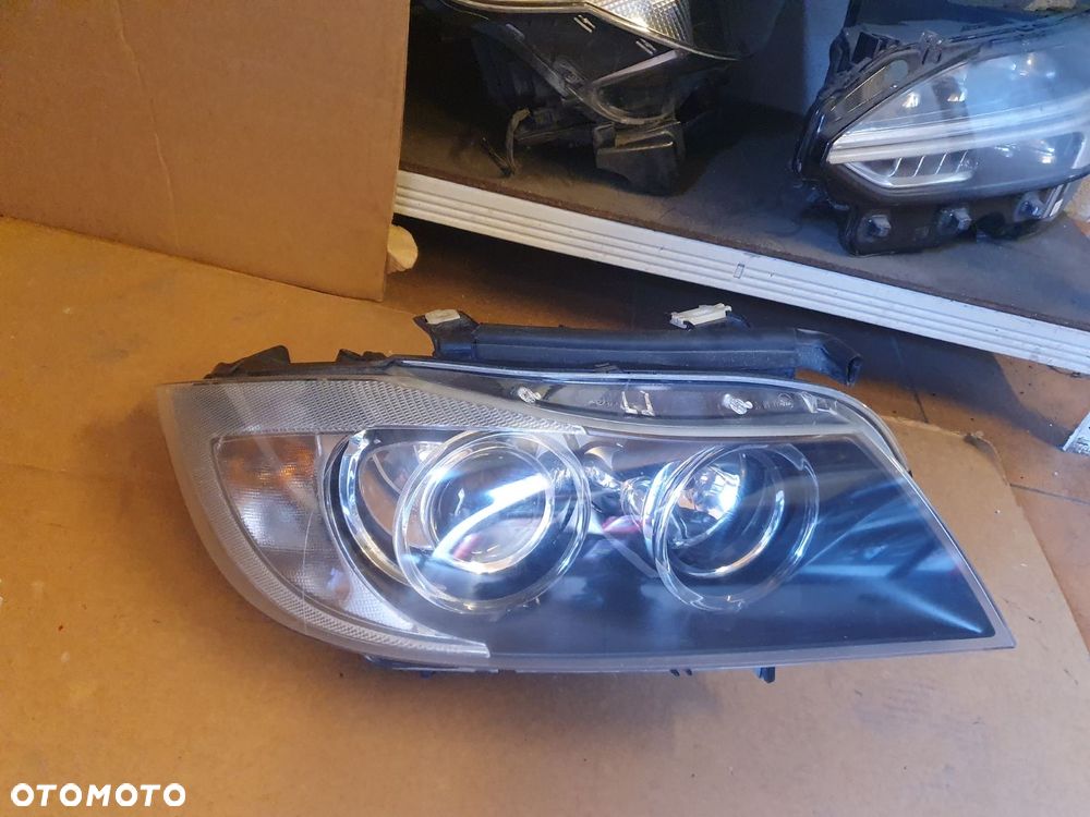 REFLEKTOR PRAWY BMW 3 E90 E91 XENON EUROPA - 1