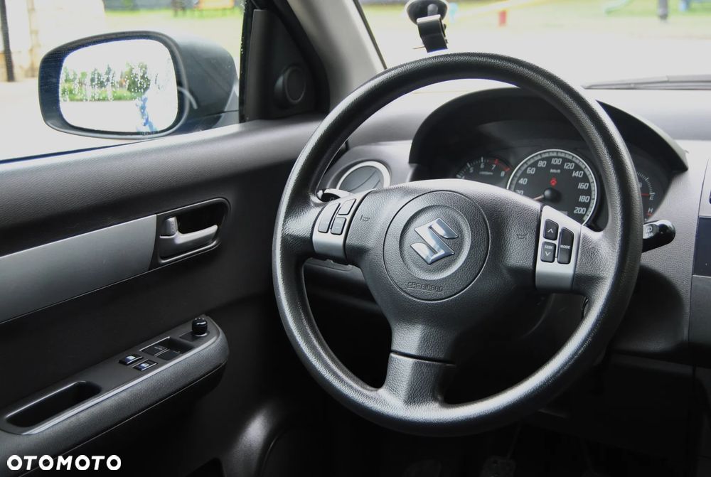 Suzuki Swift 1.3 Club - 10