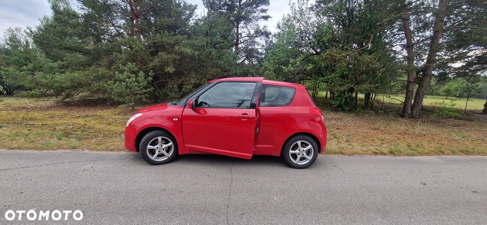 Suzuki Swift 1.3 Club - 11