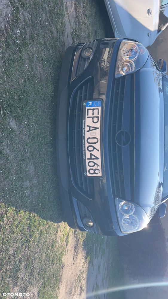 Opel Astra 1.6 Cosmo - 14