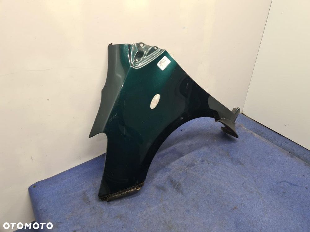 TOYOTA YARIS II LIFT BŁOTNIK PRZÓD LEWY 6S3 - 2