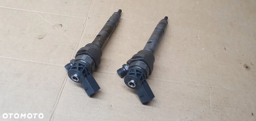 Wtrysk wtryskiwacz paliwa BMW X1 E84 Lift 2.0D 7810702 - 7