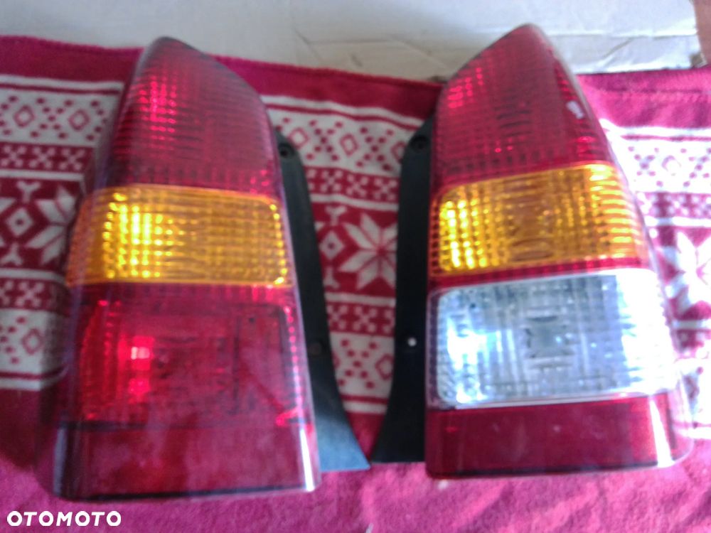 MAZDA TRIBUTE LAMPA TYL TYLNA LEWA PRAWA TYLNA CZESCI ROZNE PYTAC