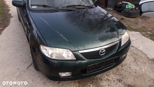 Mazda 323 323f BJ 98-03 Lift  Maska lampa zderzak pas atrapa 18J