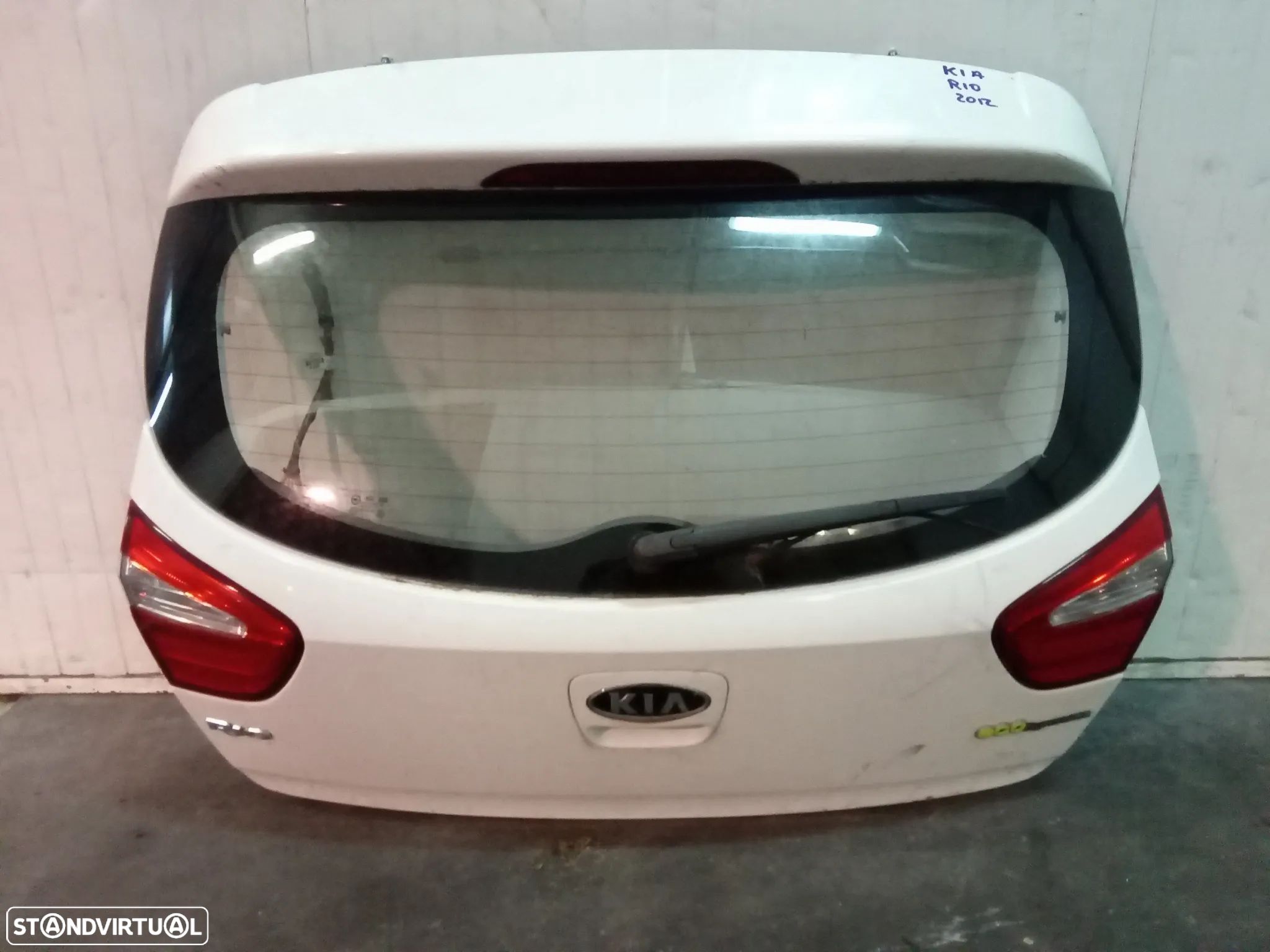 TAMPA DA MALA KIA RIO III 2011-» - 1