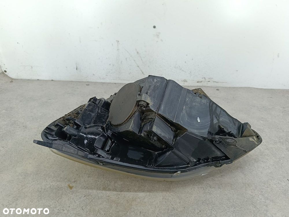 LAMPA PRZÓD PRAWA XENON OPEL ZAFIRA B 13252471 13153357 0301214282  AL  GM - 14