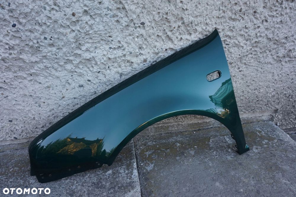 BŁOTNIK PRZEDNI LEWY VW GOLF IV LC6M