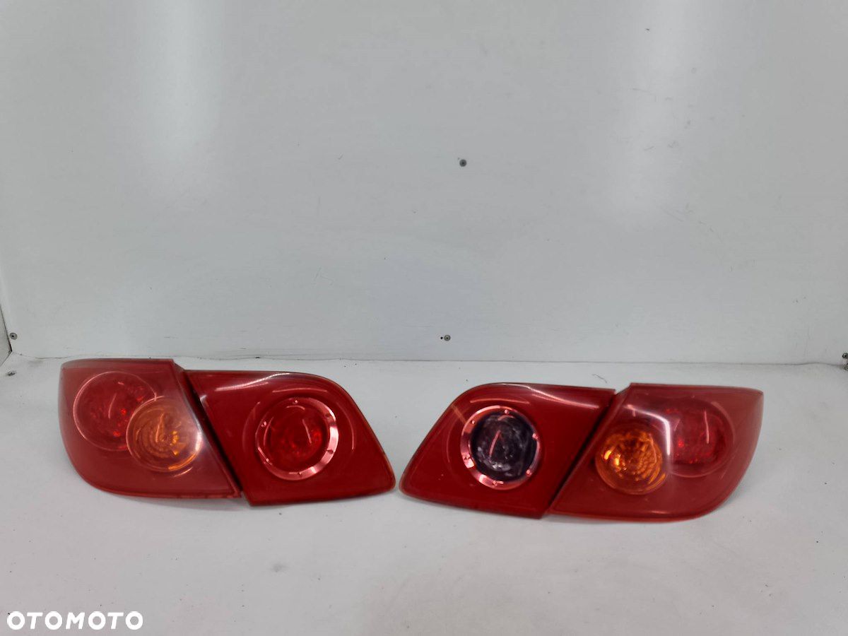 LAMPY TYŁ KOMPLET MAZDA 3 ( 99-09 ) P2912  P2913L  P2913R HATCHBACK - 1