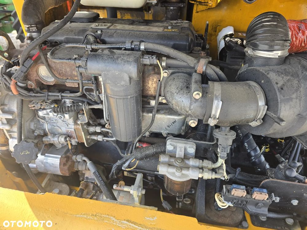 JCB 408 - 10