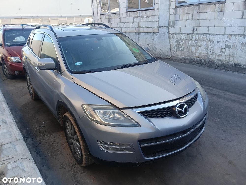 Zderzak (Błotnik, Lusterko, Maska, Drzwi, Lampa, Kierownica) Mazda Cx-9 3.5 Benzyna-Gaz 252 K 2007 r - 2
