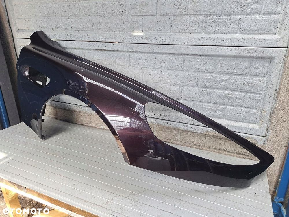 ASTON MARTIN RAPIDE 2010-20 BŁOTNIK PRZEDNI PRAWY ORYGINAŁ