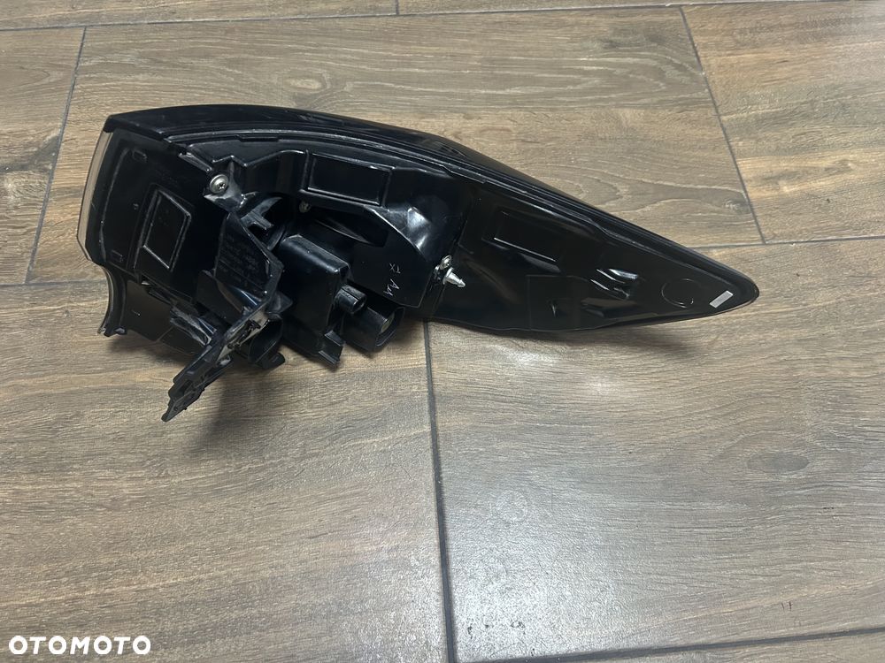 Lampa tylna lewa TOYOTA COROLLA E21 18-22 KOMBI ORG. - 3