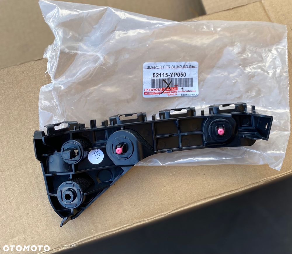 HONDA HILUX 8 VIII Lift NOWY ! ORYGINALNY ! PRAWY ŚLIZG WSPORNIK MOCOWANIE ZDERZAKA BŁOTNIKA  PRZEDNIEGO PRAWY PRZEDNI PRZÓD W zderzak 52115-YP050  52115YP050 - 2