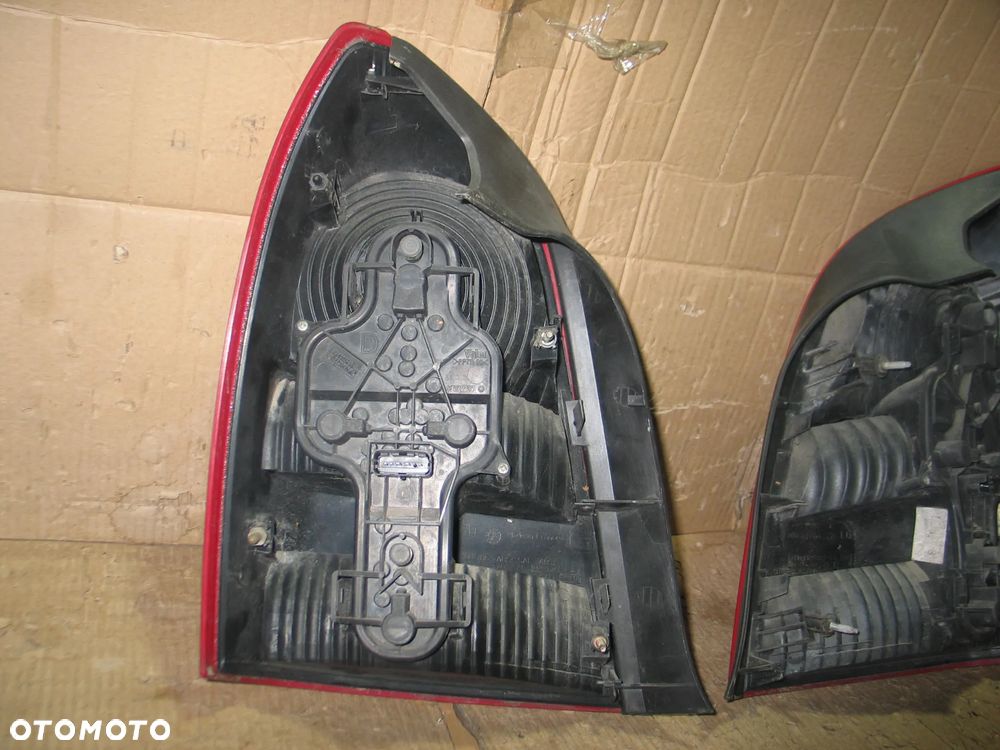 lampa tyl prawa lewa nissan primera P12 sedan oryginal - 10