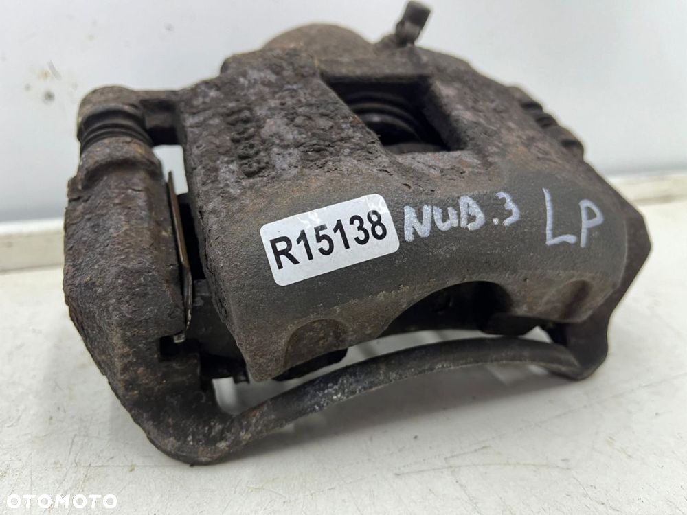 Zacisk hamulcowy Chevrolet Nubira III J200 05-12r. 2.0 cdi diesel lewy przedni jarzmo lewy przód - 7