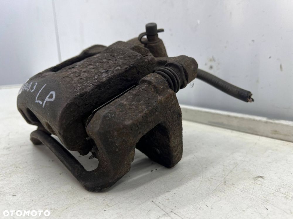 Zacisk hamulcowy Chevrolet Nubira III J200 05-12r. 2.0 cdi diesel lewy przedni jarzmo lewy przód - 4