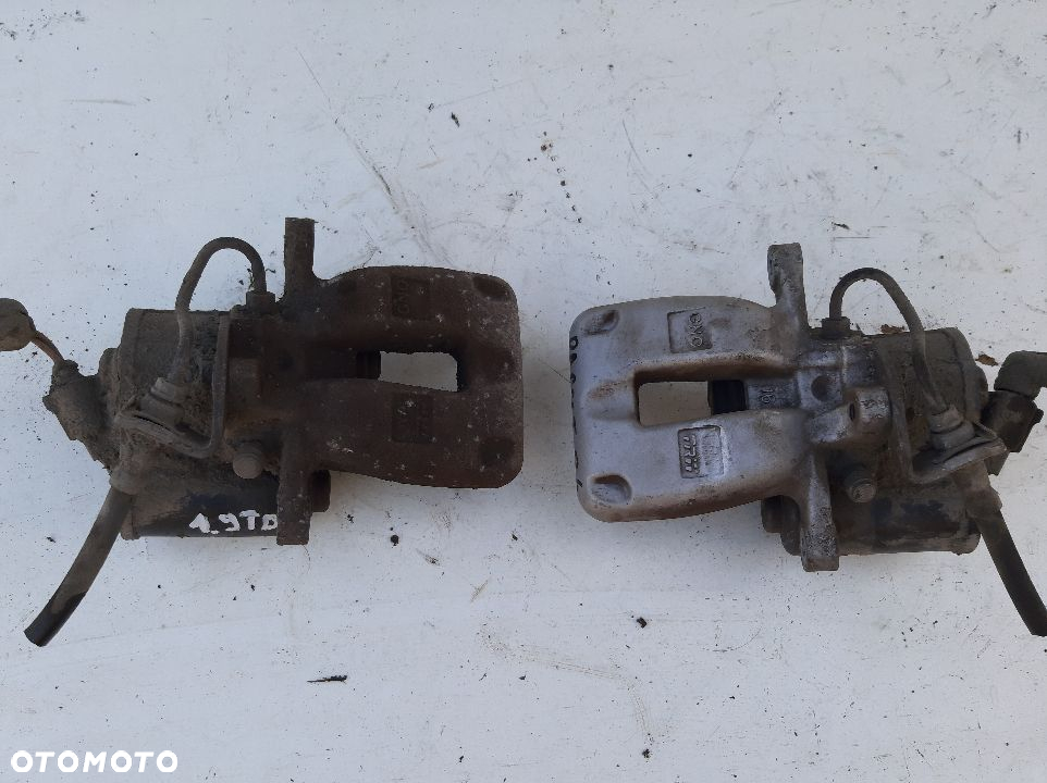 ZACISK HAMULCOWY PRAWY TYLNY VW PASSAT B6 - 5