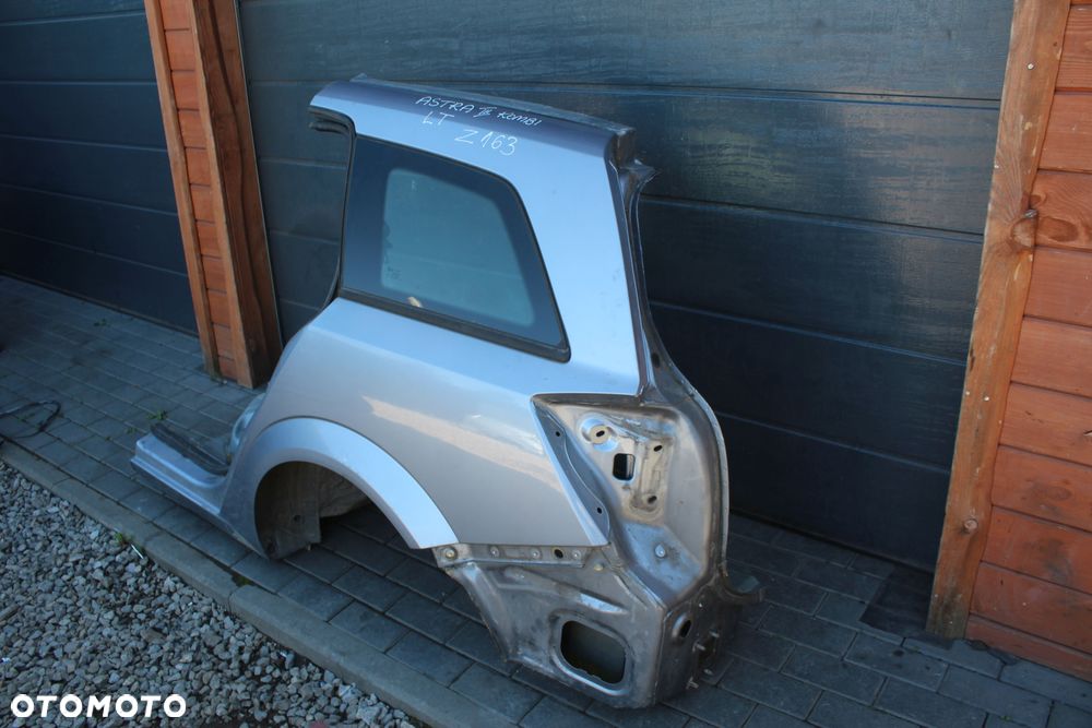 ĆWIARTKA BŁOTNIK LEWY TYLNY OPEL ASTRA H KOMBI Z163 - 3