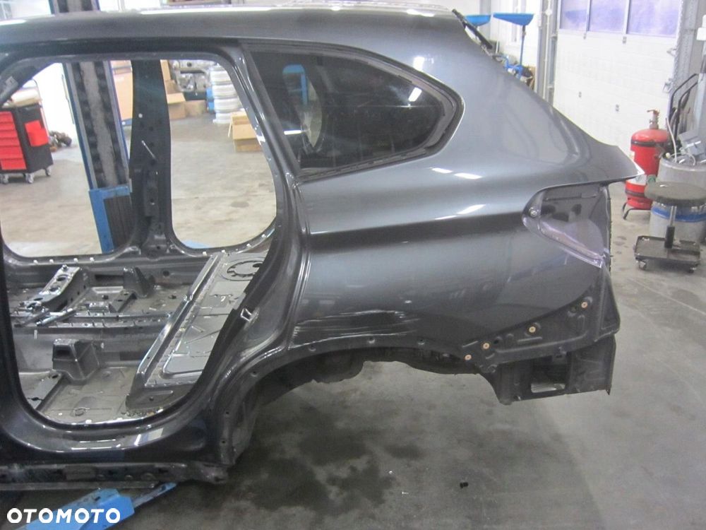 BMW X1 F48 BŁOTNIK TYLNY LEWY TYŁ PAS ĆWIARTKA POSZYCIE 41007436155 - 1