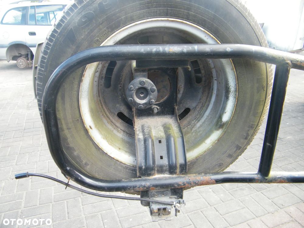 Mocowanie koła zapasowego Kia Sportage I 99r. - 2