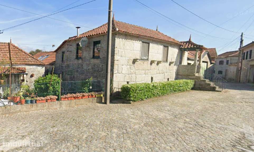 Moradia secular em granito e madeira — charme, história e conforto - Grande imagem: 2/21