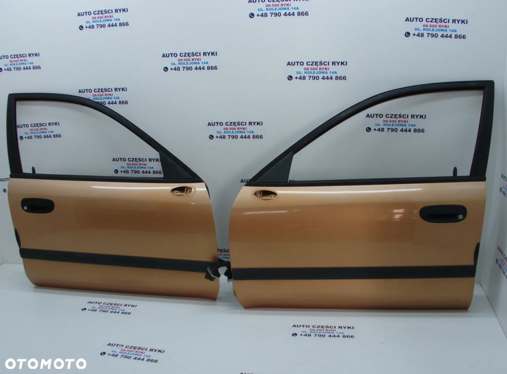 Mitsubishi Carisma drzwi prawe lewe przednie części K80 - 1