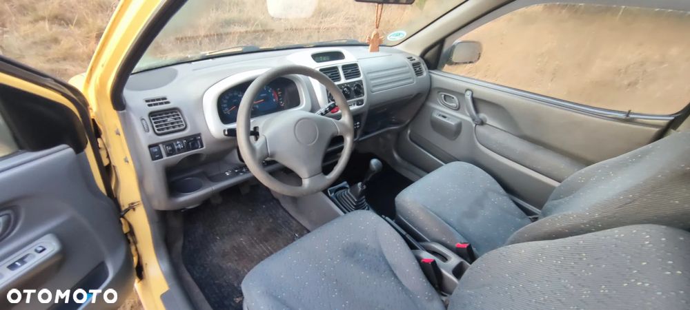 Suzuki Ignis 1.3 - 10