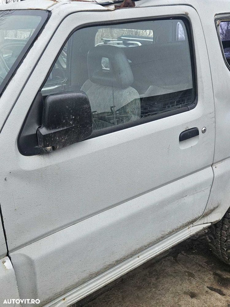 Usa dezechipata stanga/dreapta fata Suzuki Jimny 2003 - 2