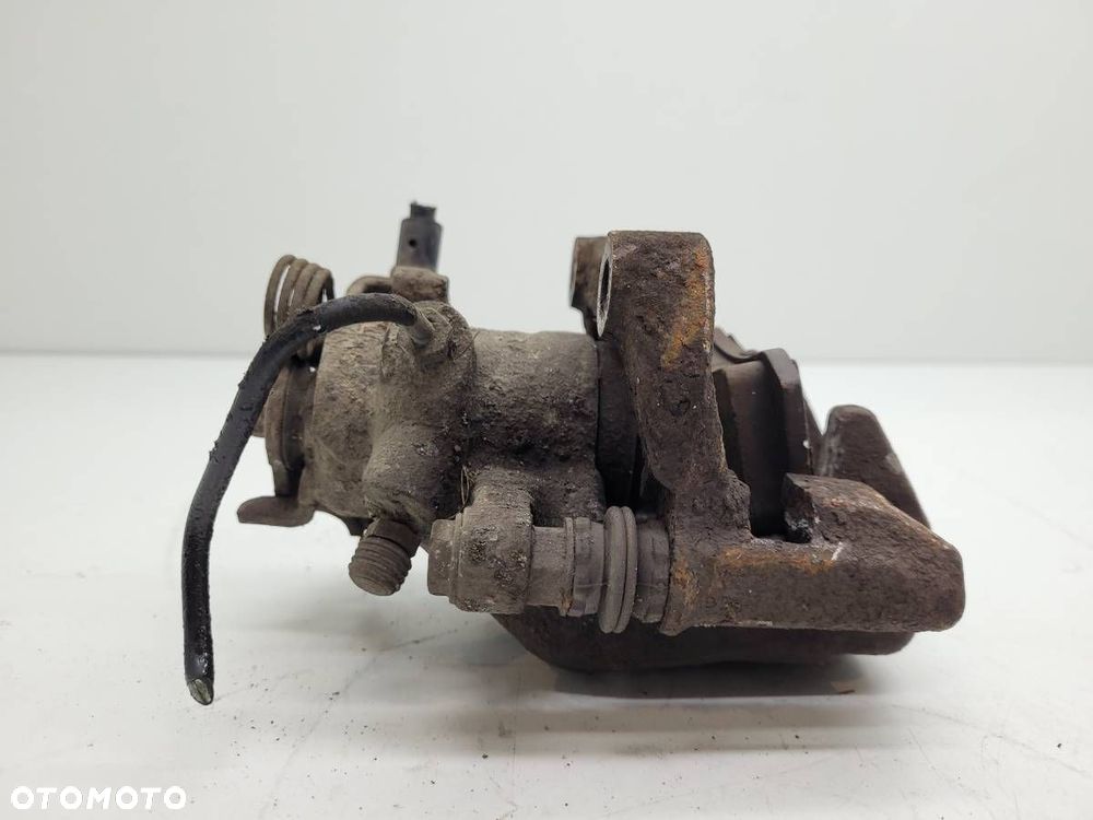 ZACISK HAMULCOWY TYŁ TYLNY PRAWY JARZMO PEUGEOT 307 1.6 HDI - 4