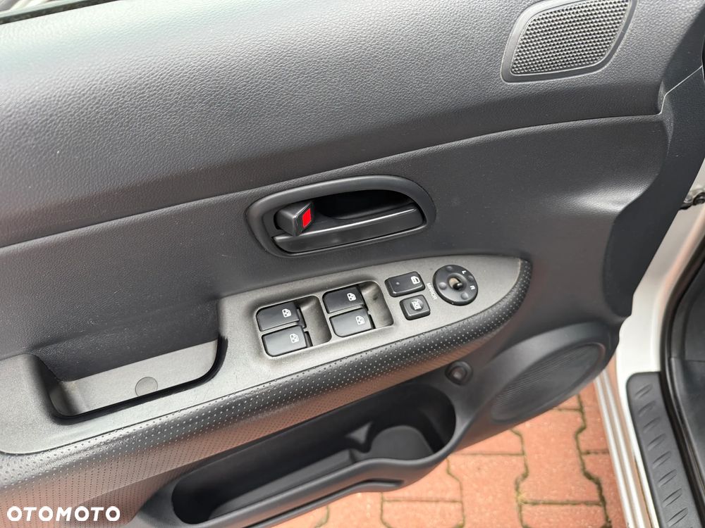 Kia Carens 2.0 CVVT EX - 13