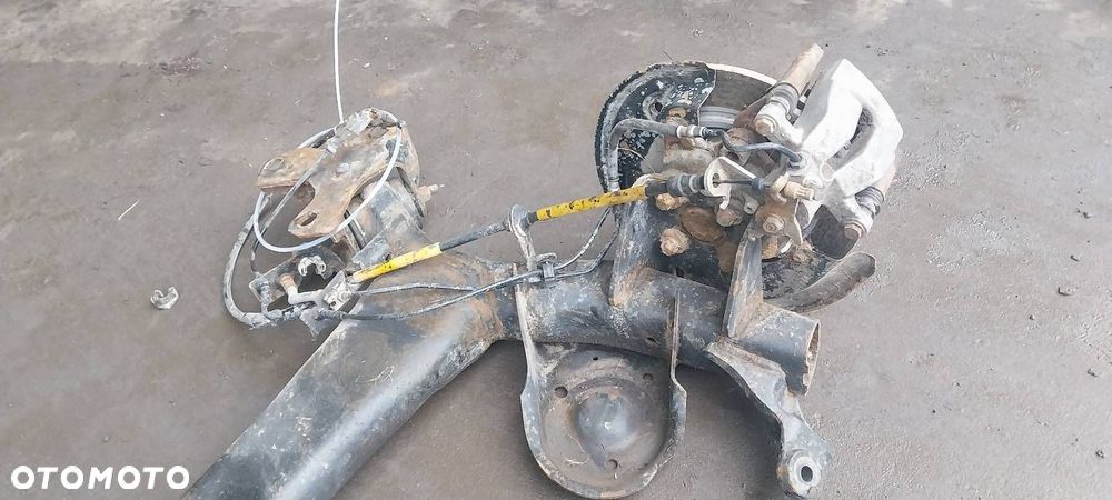 BELKA OŚ ZAWIESZENIA TYŁ TARCZE Z ABS RENAULT MEGANE III KOMBI 1.6 16V - 2