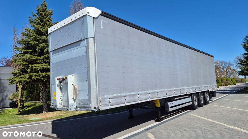 Schmitz Cargobull NACZEPA///SCHMITZ///2021///FIRANKA///MULDA 7.20///ALUFELGI///OŚ PODNOSZONA///ZBROJONA PLANDEKA///DACH PODNOSZONY///CERTYFIKAT XL///STAN BARDZO DOBRY - 1