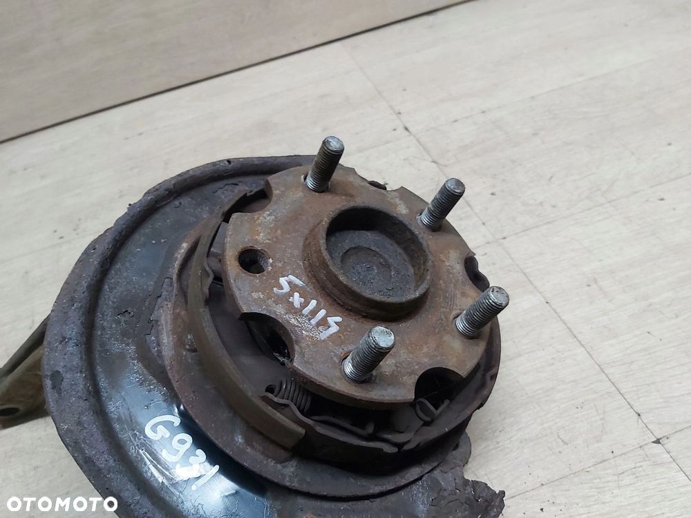 TOYOTA Avensis T25 03-08 r 2,2 d4d zwrotnica LEWY tył piasta 5x114,3 - 2