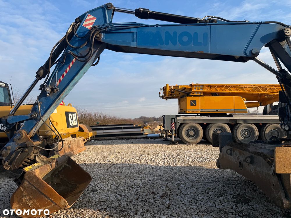 Caterpillar M318D - 2