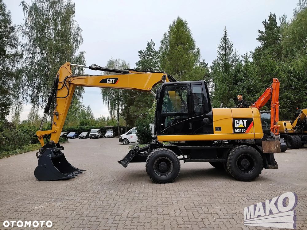 Caterpillar M313D - 1