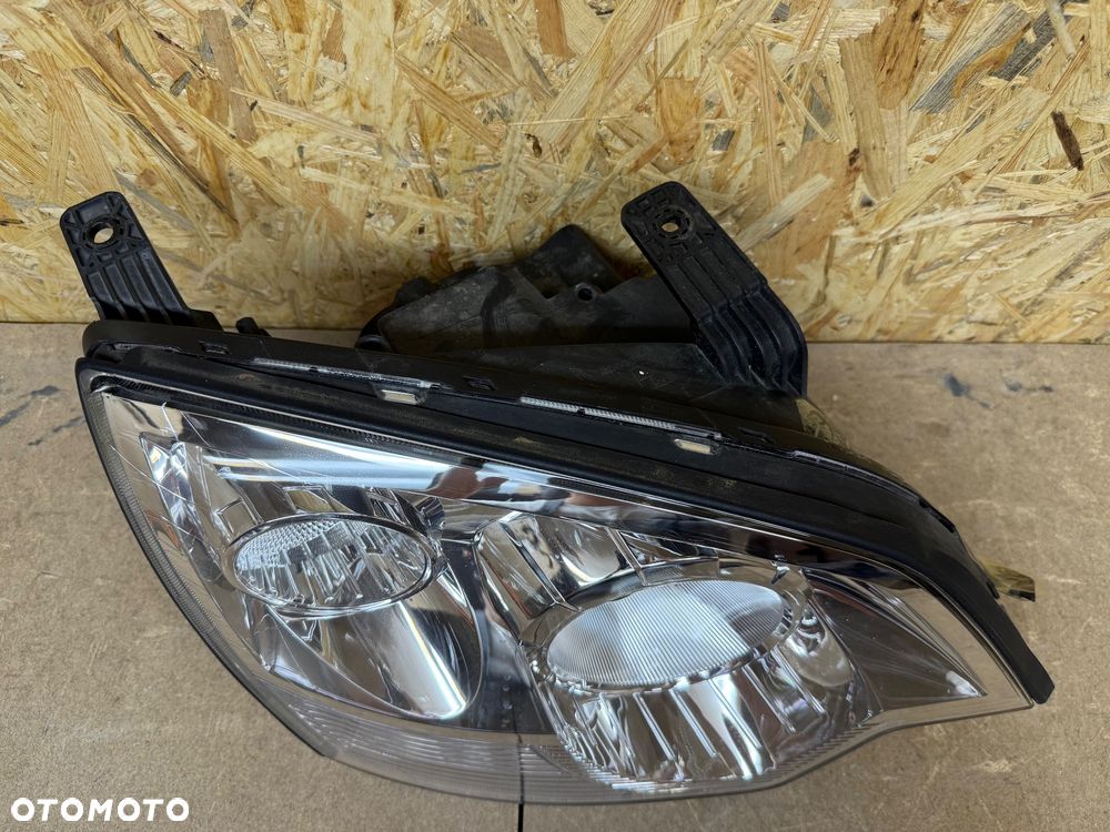 LAMPA PRAWA XENON OPEL ANTARA LIFT - 12