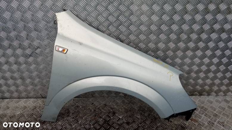 BŁOTNIK PRAWY PRZEDNI OPEL ASTRA H - 1