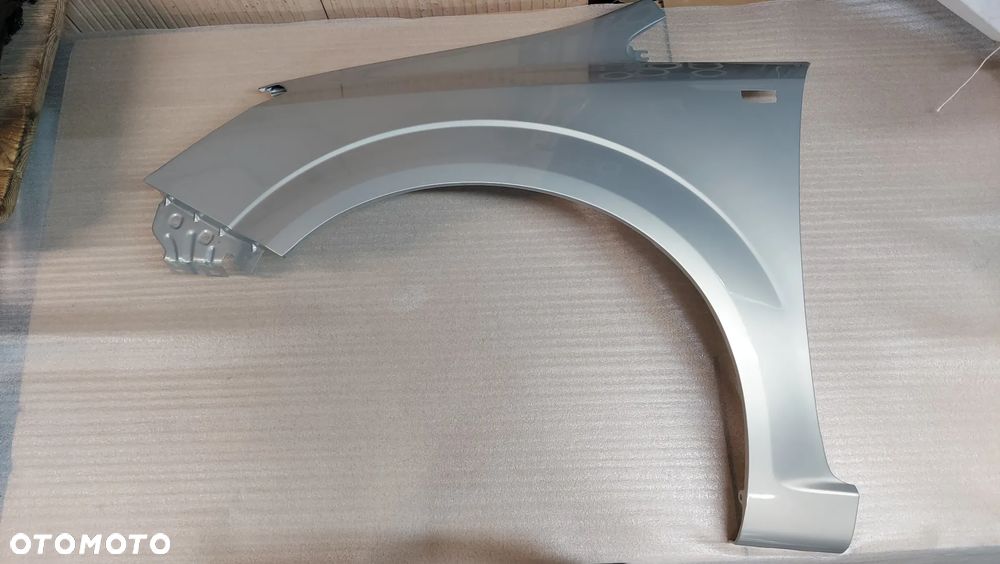 ZAFIRA B 05-11 rok BŁOTNIK LEWY LUB PRAWY Z167 CYNK - 1