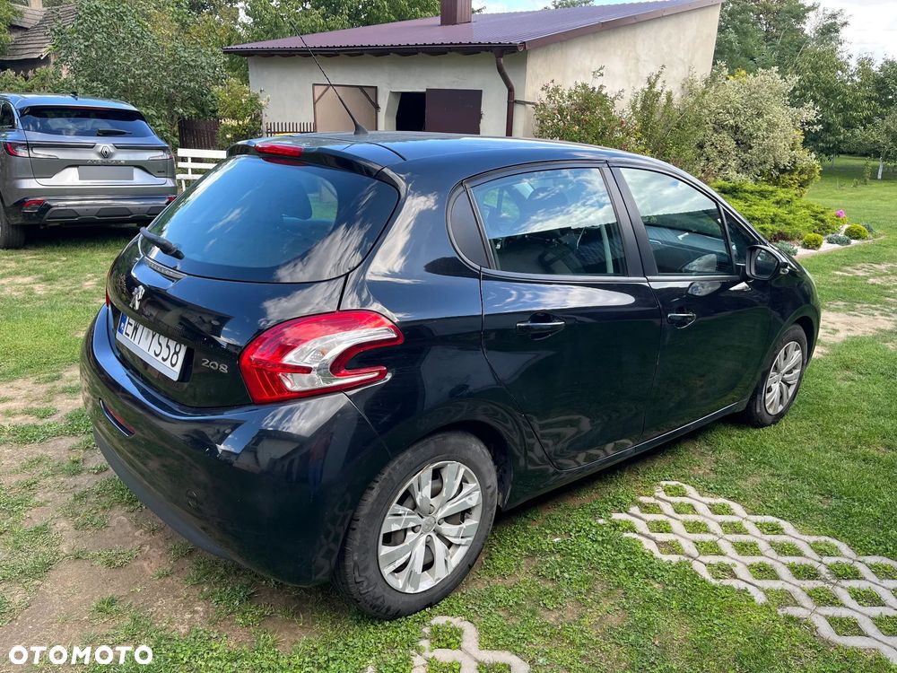 Peugeot 208 2013 photo 3