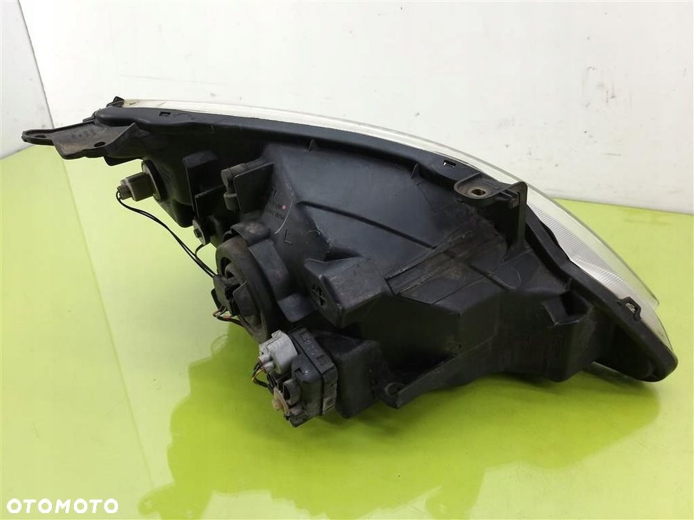Reflektor lampa przód lewa Suzuki Liana 2001–2010 KOITO 10032662 - 2