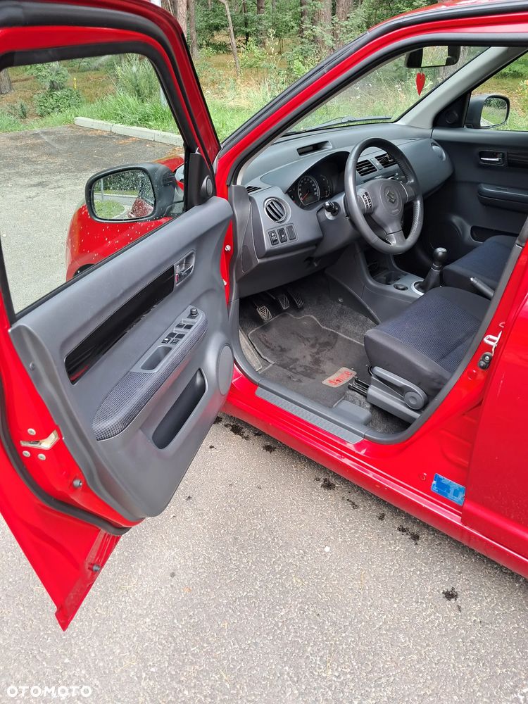 Suzuki Swift 1.3 Club - 8