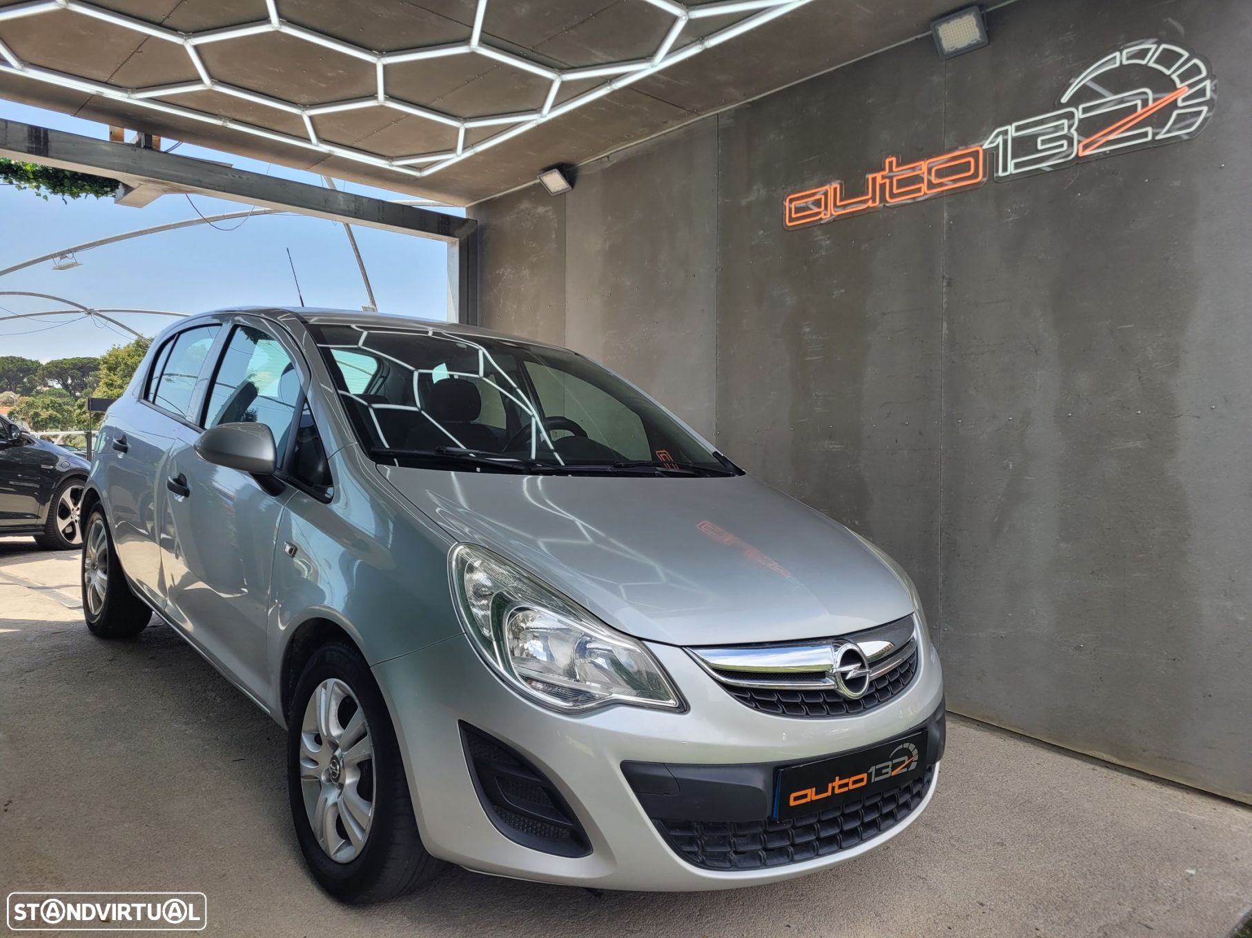 Opel Corsa 1.2 Cosmo - 1