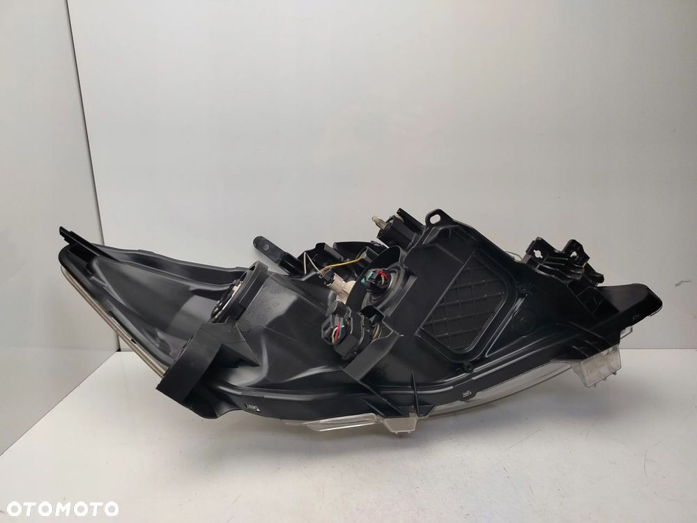 TOYOTA AURIS I LIFT 09R- REFLEKTOR LAMPA LEWY PRZÓD LEWA PRZEDNIA - 10