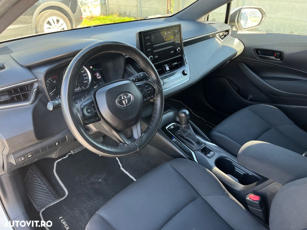 Toyota Corolla Sedan 1.8 HSD Business - 13