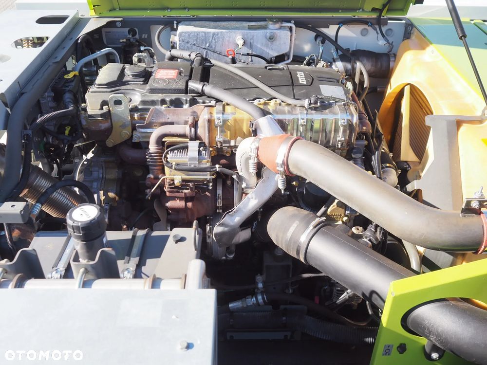 Claas Tucano 570 + V680 - 10