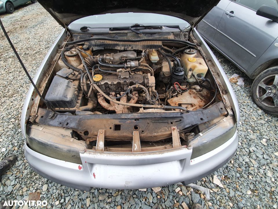 Dezmembrari  Opel CALIBRA A (85)  1990  > 1997 2.0 i Benzina - 6