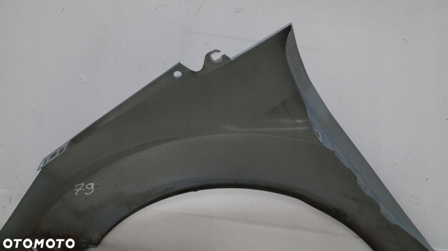 BŁOTNIK PRZEDNI PRAWY FORD FIESTA MK7 79 - 11