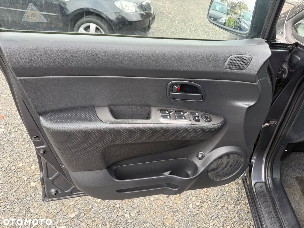 Kia Carens 2.0 CVVT EX - 18