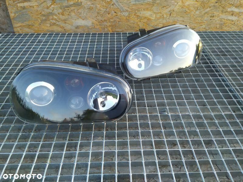 REFLEKTOR 2 SZT KPL EUROPA DEPO LEWA PRAWA VW GOLF IV MK4 SOCZEWKA PRZÓD - 1